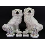 A group of Staffordshire ceramics, 19th century, comprising; a pair of porcelain spill vases,