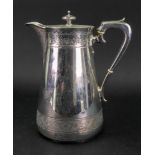 A Victorian silver water jug, Walter & John Barnard, London 1878, circular with sloping sides,