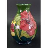 A Walter Moorcroft pear shaped vase, tub