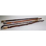 A Chinese Malacca walking cane with embossed silver pommel, 89cm, a bamboo riding crop,