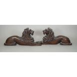 A pair of French carved oak flatback lions, 17th century style, probably 19th century,