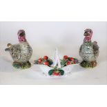 A pair of Continental pottery turkey sauce tureens, covers and ladles, probably Le Nove,