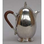 A silver three piece part tea set, comprising; a hot water jug,