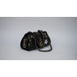 A Versace black leather shoulder bag,