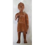 An Osei Bonsu carved Ashanti tribal wooden figure of a female native, (a.f.), 25.5cm high.