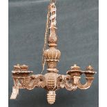 An Italian carved wooden five branch chandelier, 19th century, distressed grey with gilt traces,