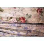 A pair of lined blue foliate curtains, 140cm wide x 252cm long,