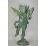 A verdigris patinated bronze fountain head,