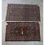 A Baluchistan rug, the black field with three columns of flowerheads, minor animal motifs,