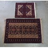 A Baluchistan rug, the black field with a central column, supporting columns of plants,