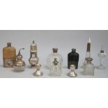 Silver and silver mounted wares, comprising; a rushwork bound glass spirit flask,