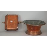 A Dutch copper cistern and well, 19th century, on an associated wrought iron stand,