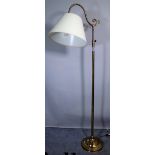 A 20th century brass adjustable standard lamp on plinth base, 156cm high.