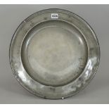An English pewter charger, probably 17th century, touch marks to the rear, 42.5cm diameter.