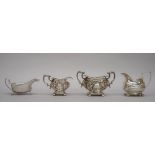 Silver, comprising; a twin handled sugar bowl, with foliate embossed decoration,