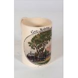 A small creamware mug, date 1802,