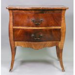 A Louis XV style faux walnut commode, of