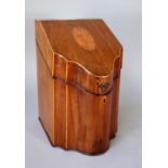 A George III inlaid mahogany slope top, serpentine fronted knife box with later interior,