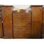 A Victorian mahogany sentry wardrobe, with two short and four long graduated drawers,