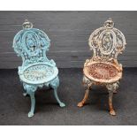 A pair of Victorian cast iron garden chairs, 40cm wide x 84cm high.