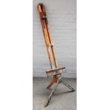 Foundation; a 20th century beech folding artist's easel, 81cm wide at base.