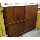 Danish furniture: a 20th century mahogany side cabinet with two pairs of sliding doors,
