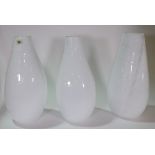 A set of three Murano opaque vases with moulded faux alligator pattern, 45cm high.