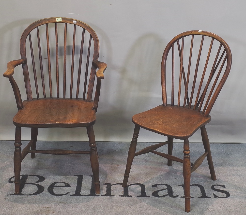 A set of four ash and elm stick back scullery chairs, one stamped T.C to underside, (4).