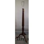 A Victorian mahogany standard lamp on fluted column and ball and claw feet, 149cm high.