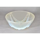 A Lalique 'Villeneuve' opalescent glass bowl, designed 1928, No 402, 31cm diamater. Illustrated.