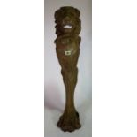 A group of four heavy cast iron furniture supports with lion mask moulded decoration, 110cm high.