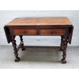 A 19th century Portuguese/ Spanish rosewood drop flap side table with a pair of frieze drawers on