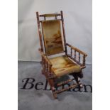 A 19th century beech framed American rocking chair.