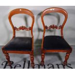 A set of four Victorian mahogany balloon back dining chairs, (4),