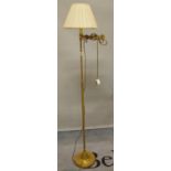 A 20th century brass adjustable standard lamp, 160cm high.