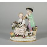 A Meissen group of two children representing Autumn, late 19th/early 20th century,