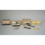 A quantity of pens, including; a 'Parker 51' set, a Sheaffer fountain pen,