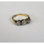 A 9ct gold and diamond three stone ring,