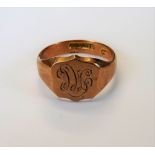 A 9ct gold, shield shaped gentleman's signet ring, monogram engraved, Birmingham 1918, ring size V,
