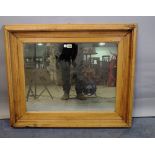 A rectangular pine wall mirror with moulded frame, 86cm wide x 71cm high.