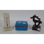 An onyx desk thermometer, 12cm high, a blue glass rectangular casket with gilt metal mounts,