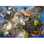 A large collection of costume jewellery, comprising; necklaces, bangles and earrings, (qty).