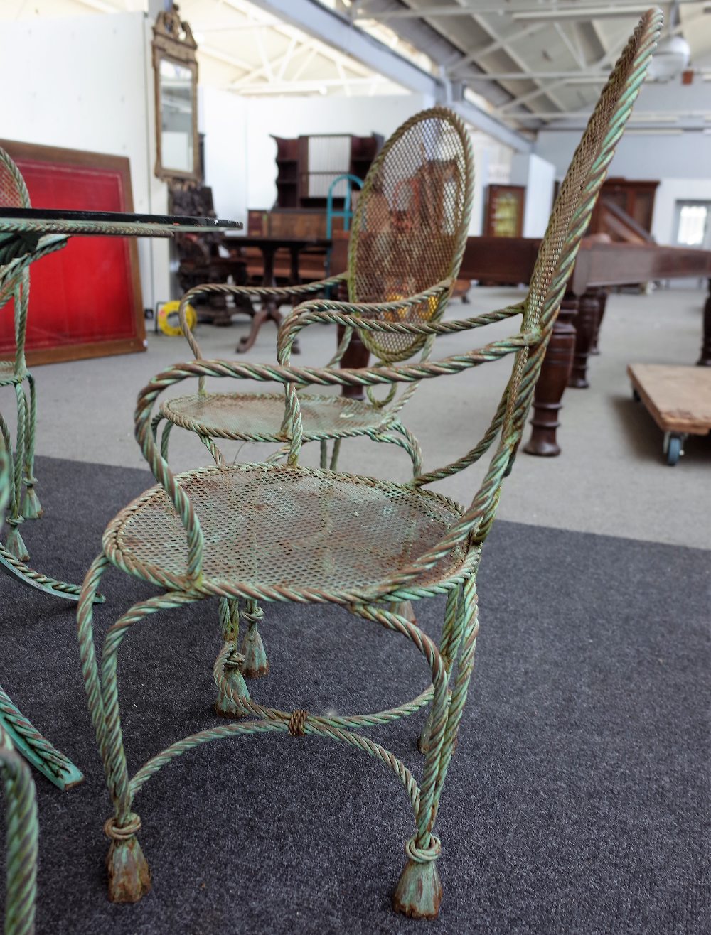 A green painted wrought iron circular glass top garden table and six matching armchairs, - Image 2 of 5
