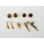 A pair of 9ct gold and amethyst set single stone earstuds,