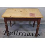 A late Victorian rectangular pine kitchen table on tapering supports, 107cm wide x 76cm high.
