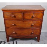 An early Victorian mahogany bowfront chest of two short and two long graduated drawers on bracket