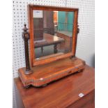 A late William IV satinwood banded mahogany toilet mirror with split bobbin mounted bow base,