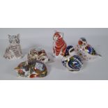 Six Royal Crown Derby Imari paperweights including a duckling, cat, hedgehog, cat,