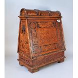 An unusual 19th century walnut box of tapering form, the fall front over single drawer,