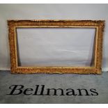 An early 20th century rectangular picture frame, 165cm wide x 95cm high.